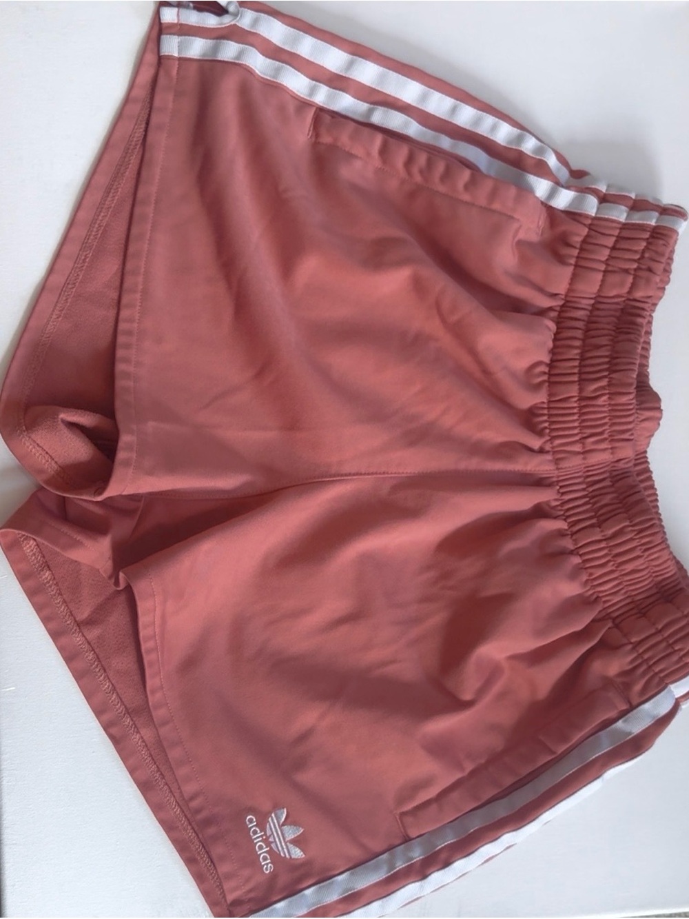 adidas Coral Pink Women’s Athletic Shorts with White Stripes